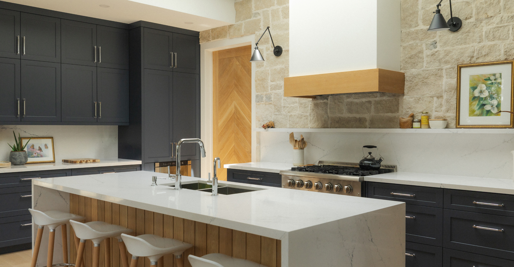 Luxury kitchen featuring marble backsplash